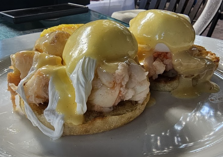 Blue Heaven signature dishes Lobster Egg BenedictJamaican Jerk ChickenKey Lime Pie